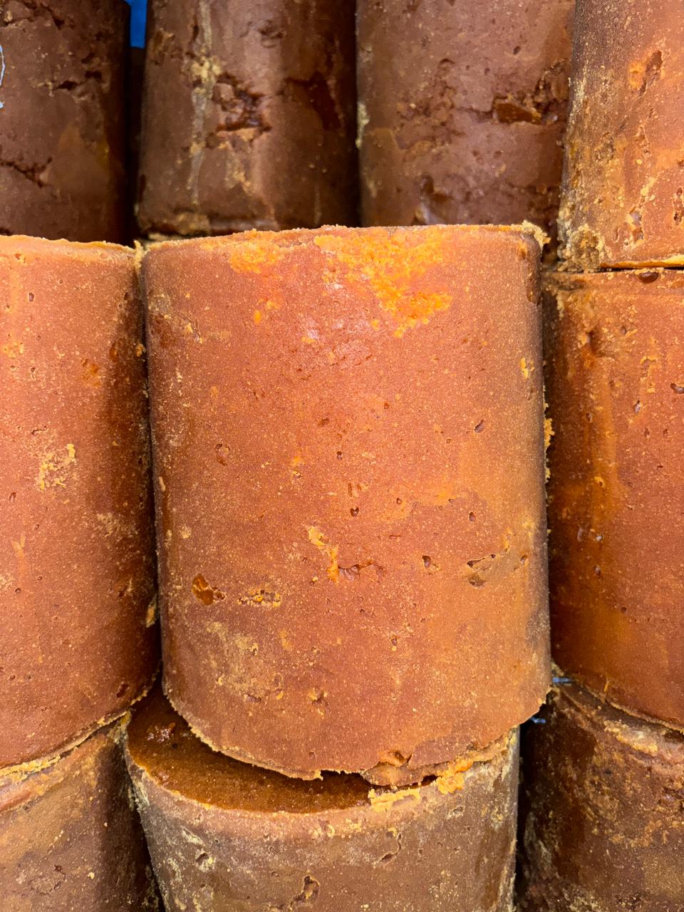 Detailed view of jaggery block showing rich golden-brown color and authentic texture